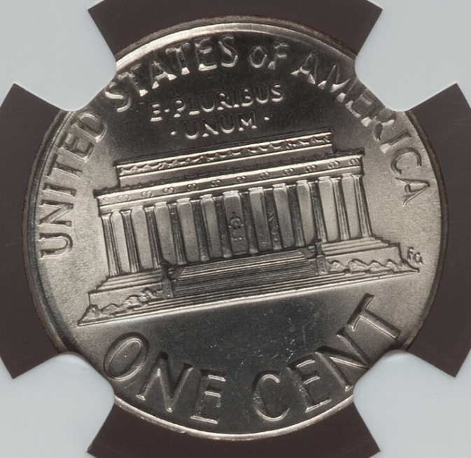 1991 Lincoln cent struck on a dime planchet showing the cent design on a significantly smaller copper-nickel disc next to a normal cent for comparison